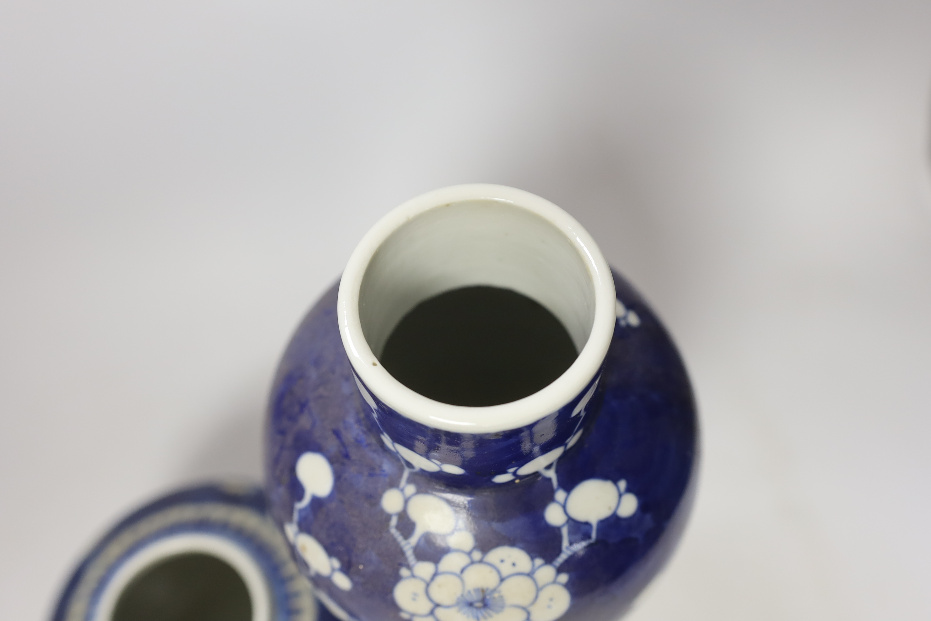 Three early 20th century Chinese blue and white jars (one with cover) and a similar vase and cover (a.f.), tallest 37cm